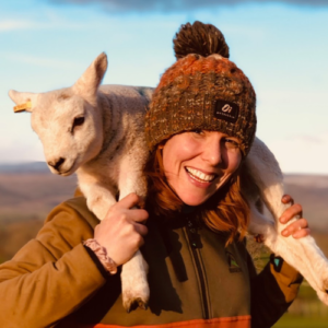 Charlotte Ashley Charlotte Ashley carrying sheep
